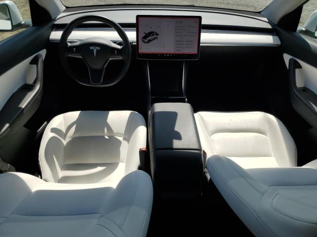 Photo 8 from auction – 2021 TESLA MODEL Y with VIN 5YJYGDED7MF121469