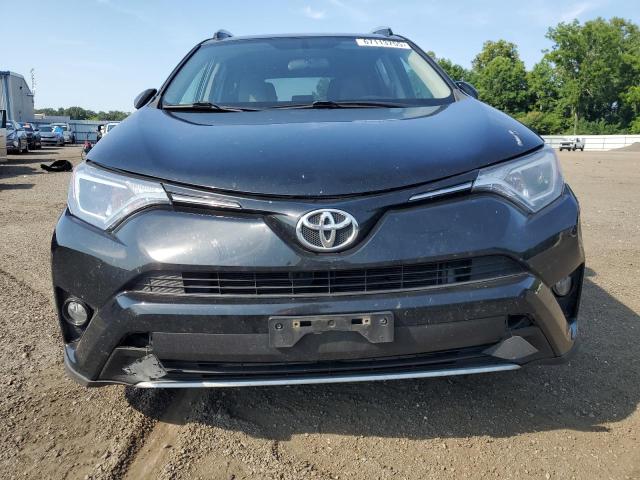 Photo 5 from auction – 2016 TOYOTA RAV4 XLE with VIN 2T3RFREV7GW447462