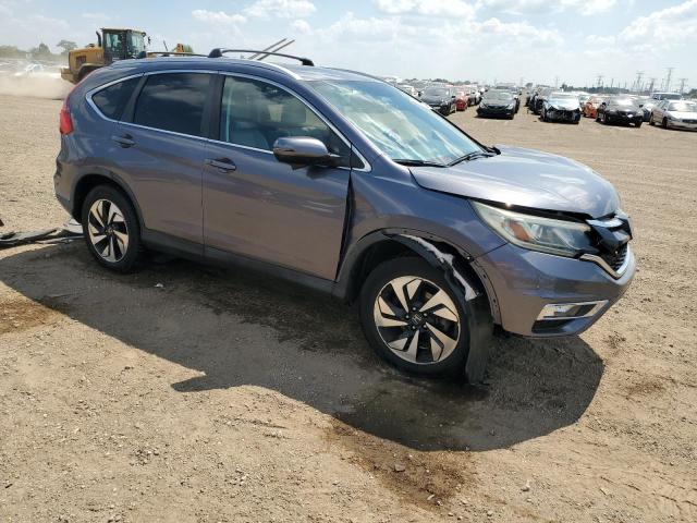 Photo 4 from auction – 2016 HONDA CR-V TOURI with VIN 5J6RM4H91GL044243