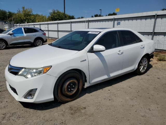 Photo 1 from auction – 2014 TOYOTA CAMRY HYBR with VIN 4T1BD1FK2EU132216