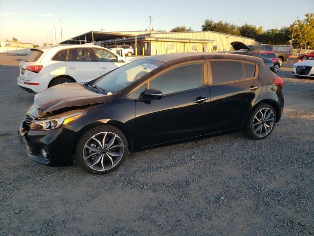 KIA FORTE EX 2017 with VIN 3KPFN5A37HE113254 - Photo from auction