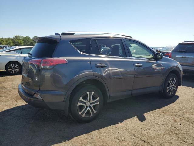 Photo 3 from auction – 2018 TOYOTA RAV4 LE with VIN JTMBFREV1JJ194565