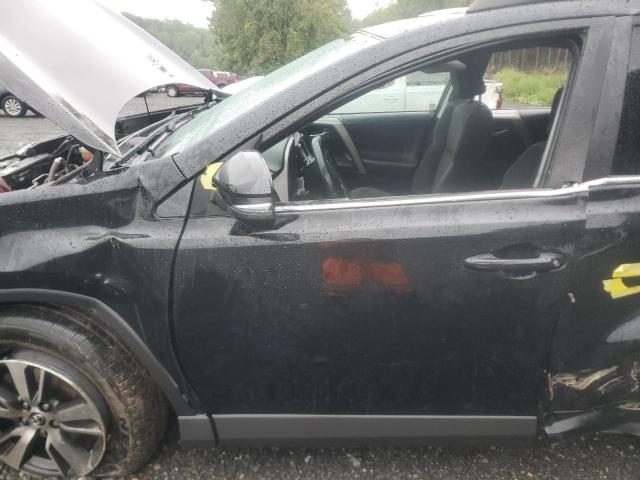 Photo 7 from auction – 2017 TOYOTA RAV4 XLE with VIN 2T3RFREV4HW662427