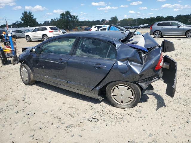 Photo 2 from auction – 2010 HONDA CIVIC HYBR with VIN JHMFA3F21AS002314