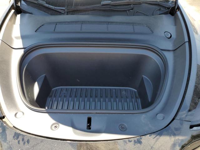 Photo 11 from auction – 2023 TESLA MODEL Y with VIN 7SAYGAEE3PF843052