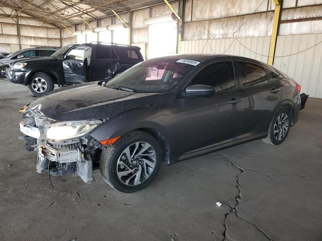 HONDA CIVIC EX 2017 with VIN 19XFC2F71HE059028 - Photo from auction