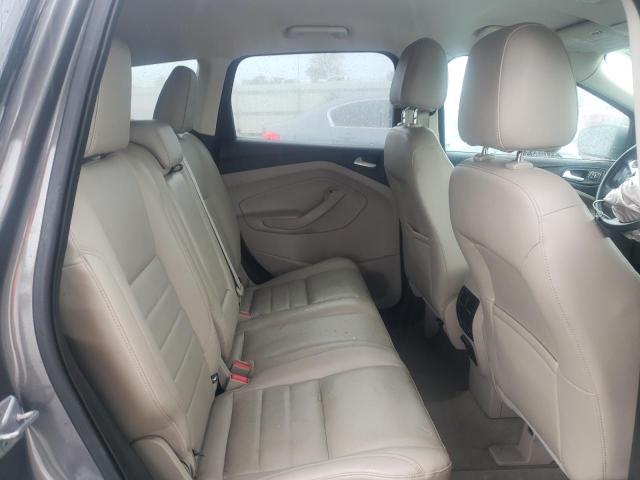 Photo 11 from auction – 2014 FORD ESCAPE TITANIUM with VIN 1FMCU0JX8EUA97747