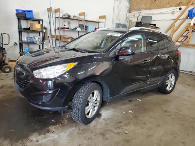HYUNDAI TUCSON GLS 2011 with VIN KM8JUCACXBU307959 - Photo from auction