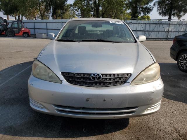 Photo 5 from auction – 2003 TOYOTA CAMRY LE with VIN 4T1BF32K73U555639