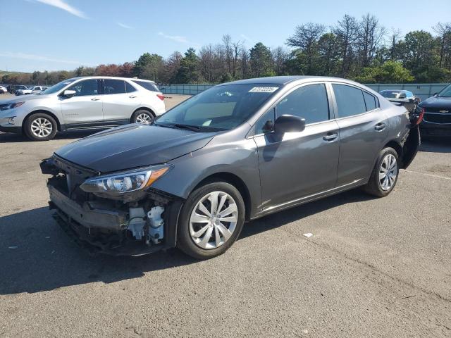 SUBARU IMPREZA 2019 with VIN 4S3GKAA63K3605715 - Photo from auction