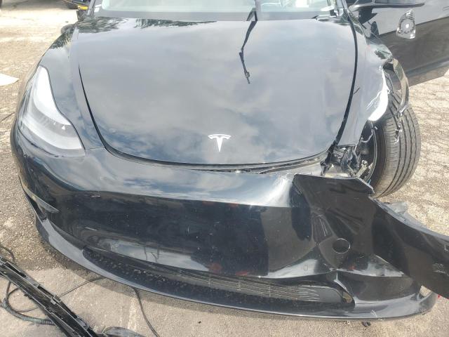 Photo 11 from auction – 2022 TESLA MODEL 3 with VIN 5YJ3E1EA0NF369309