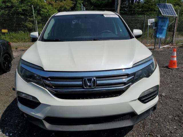 Photo 5 from auction – 2018 HONDA PILOT EXL with VIN 5FNYF5H5XJB010651