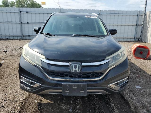 Photo 5 from auction – 2015 HONDA CR-V TOURING with VIN 5J6RM4H97FL062776
