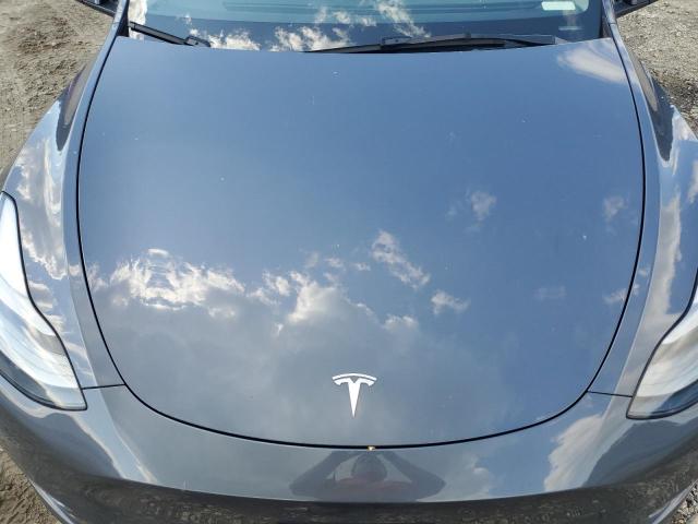 Photo 11 from auction – 2023 TESLA MODEL Y with VIN 7SAYGDEE4PF829453