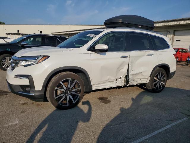 HONDA PILOT TOUR 2022 with VIN 5FNYF5H61NB003005 - Photo from auction