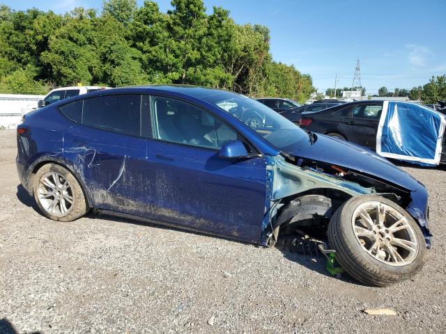 Photo 4 from auction – 2023 TESLA MODEL Y with VIN LRWYGDEE2PC136887