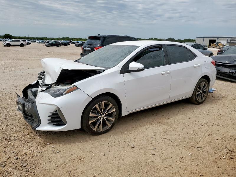 TOYOTA COROLLA L 2018 with VIN 5YFBURHE7JP787439 - Photo from auction