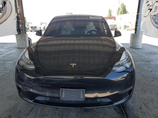 Photo 5 from auction – 2021 TESLA MODEL Y with VIN 5YJYGDEF0MF089143