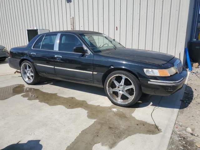 Photo 4 from auction – 2002 MERCURY GRAND MARQ with VIN 2MEFM75W62X618060