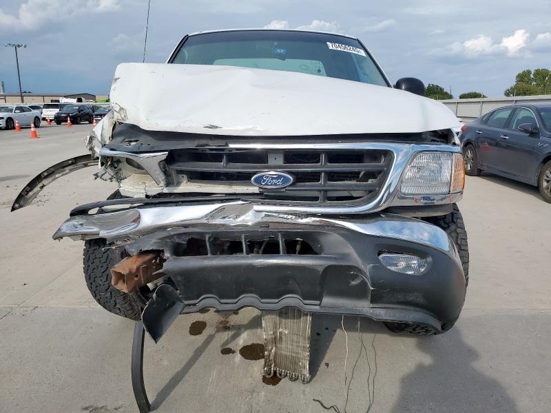 Photo 5 from auction – 2000 FORD F150 with VIN 1FTRX18L7YNB50273