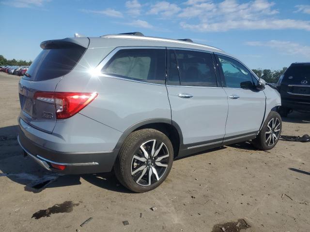 Photo 3 from auction – 2022 HONDA PILOT TOUR with VIN 5FNYF6H63NB077922