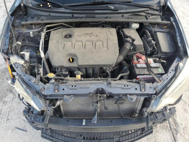 Photo 11 from auction – 2014 TOYOTA COROLLA L with VIN 5YFBURHEXEP117700