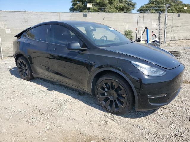 Photo 4 from auction – 2022 TESLA MODEL Y with VIN 7SAYGAEEXNF390934
