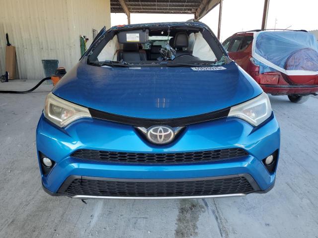 Photo 5 from auction – 2018 TOYOTA RAV4 SE with VIN JTMNFREV9JD115512