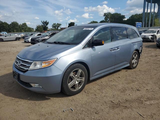 HONDA ODYSSEY TO 2012 with VIN 5FNRL5H94CB062974 - Photo from auction