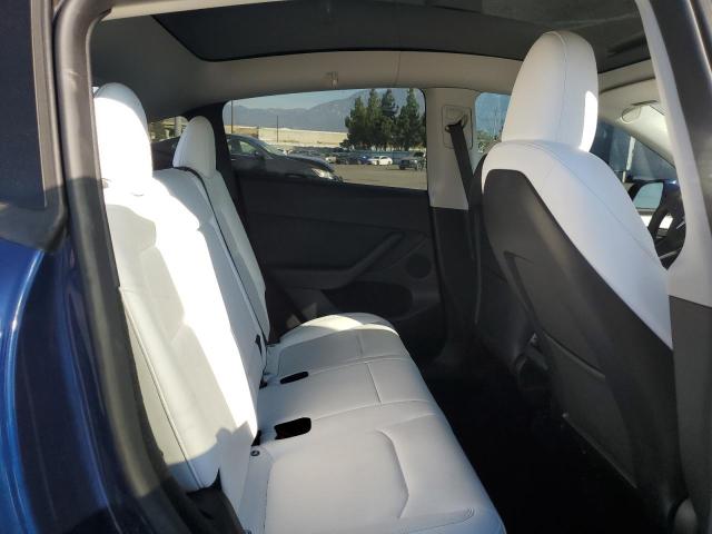 Photo 11 from auction – 2023 TESLA MODEL Y with VIN 7SAYGDEE2PF889327