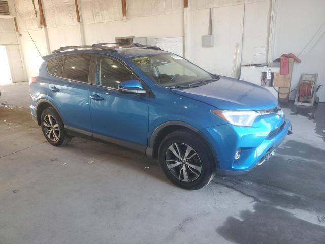 Photo 4 from auction – 2017 TOYOTA RAV4 XLE with VIN JTMWFREV5HJ710647