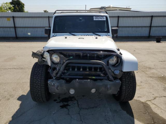 Photo 5 from auction – 2017 JEEP WRANGLER U with VIN 1C4BJWEG2HL507538