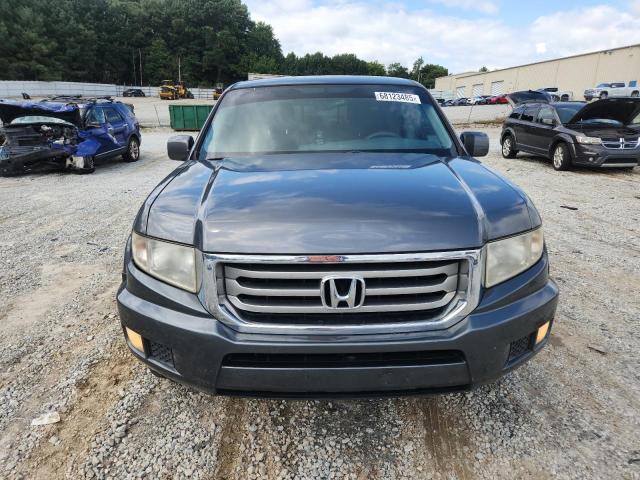 Photo 5 from auction – 2013 HONDA RIDGELINE with VIN 5FPYK1F43DB017449