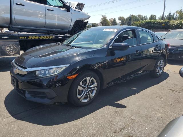 HONDA CIVIC LX 2017 with VIN 2HGFC2F52HH563298 - Photo from auction