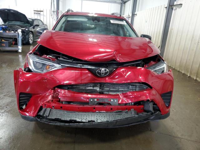 Photo 5 from auction – 2018 TOYOTA RAV4 LE with VIN 2T3BFREV3JW720437