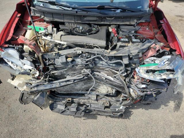 Photo 11 from auction – 2015 NISSAN ROGUE S with VIN 5N1AT2MV2FC842791