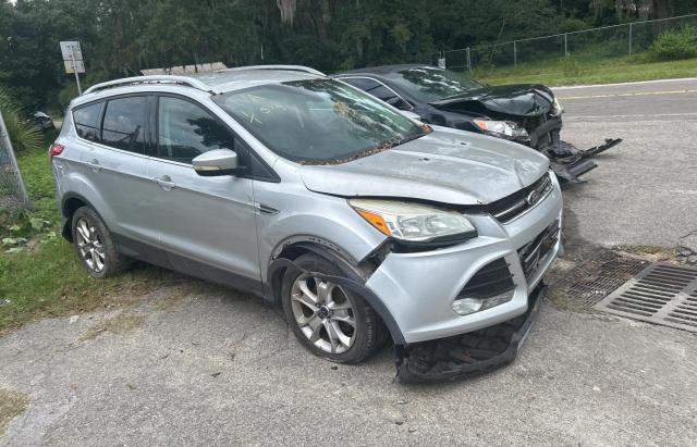 FORD ESCAPE TIT 2016 with VIN 1FMCU9JXXGUC33190 - Photo from auction