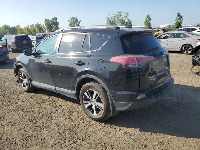 Photo 2 from auction – 2018 TOYOTA RAV4 LE with VIN 2T3BFREV7JW771780