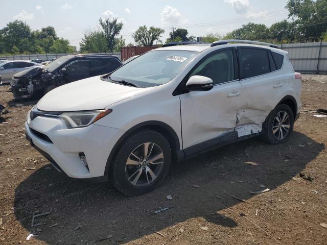 TOYOTA RAV4 XLE 2017 with VIN JTMRFREV7HJ105008 - Photo from auction