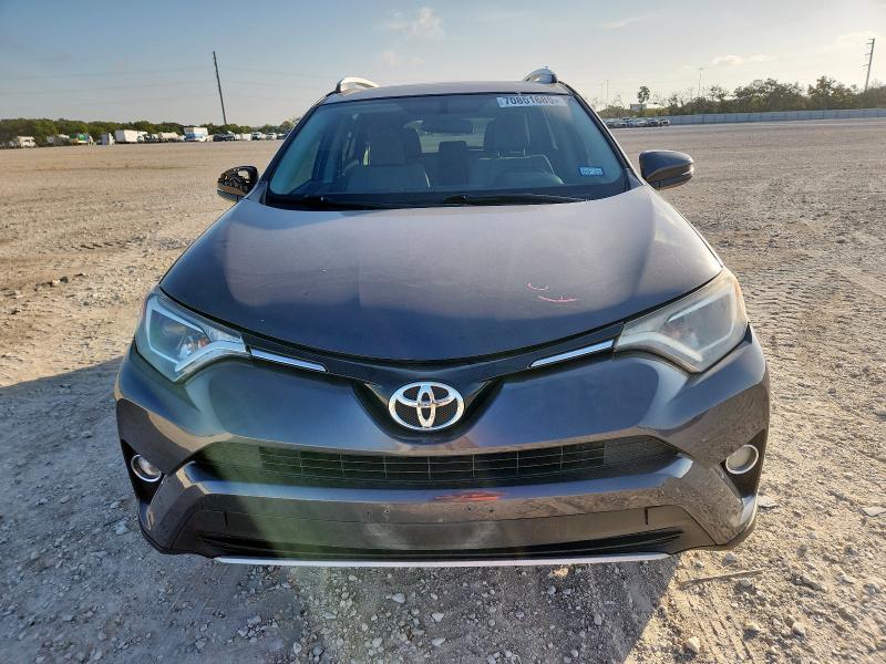 Photo 5 from auction – 2016 TOYOTA RAV4 XLE with VIN 2T3WFREV8GW245796