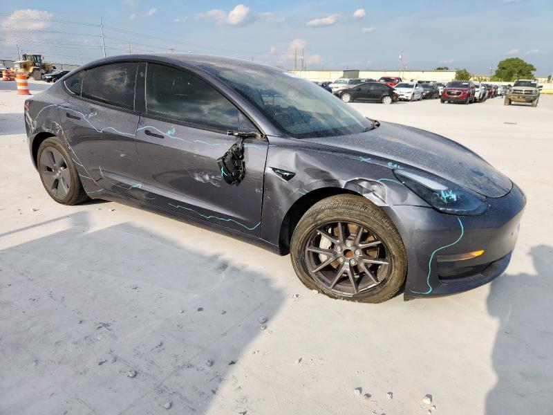 Photo 4 from auction – 2023 TESLA MODEL 3 with VIN 5YJ3E1EA4PF673049