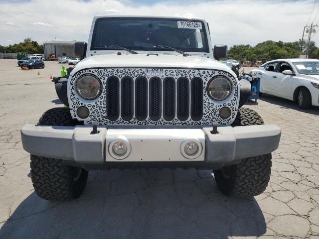 Photo 5 from auction – 2015 JEEP WRANGLER U with VIN 1C4BJWEG1FL644225