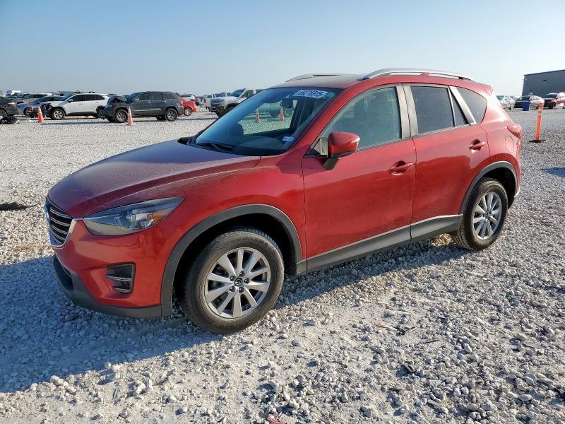 MAZDA CX-5 2016 with VIN JM3KE2CY1G0657818 - Photo from auction