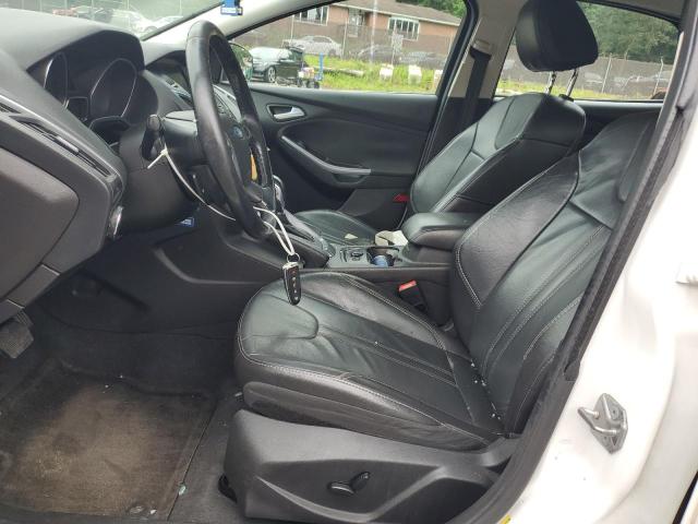 Photo 7 from auction – 2014 FORD FOCUS TITANIUM with VIN 1FADP3N24EL409557