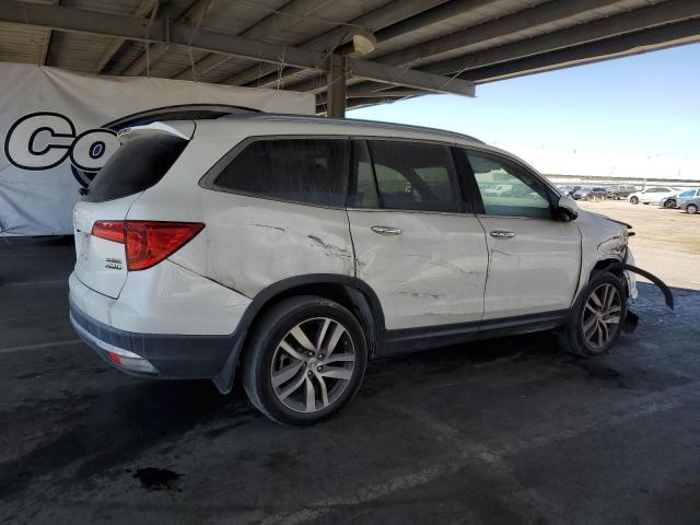 Photo 3 from auction – 2017 HONDA PILOT TOUR with VIN 5FNYF6H95HB061946