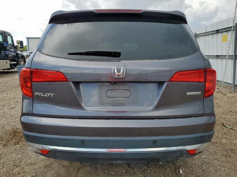 Photo 6 from auction – 2017 HONDA PILOT TOUR with VIN 5FNYF5H99HB006569