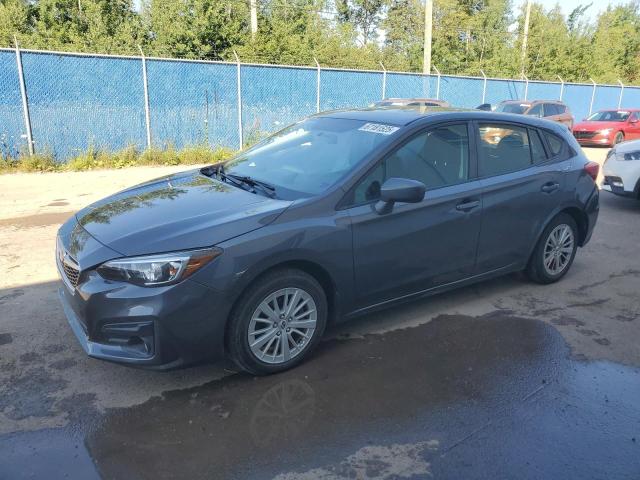 SUBARU IMPREZA PR 2018 مع رقم تعريف المركبة 4S3GTAE64J3707210 - صورة من المزاد