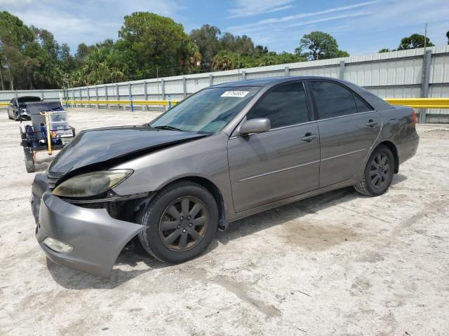 TOYOTA CAMRY LE 2003 with VIN 4T1BF32K93U566481 - Photo from auction