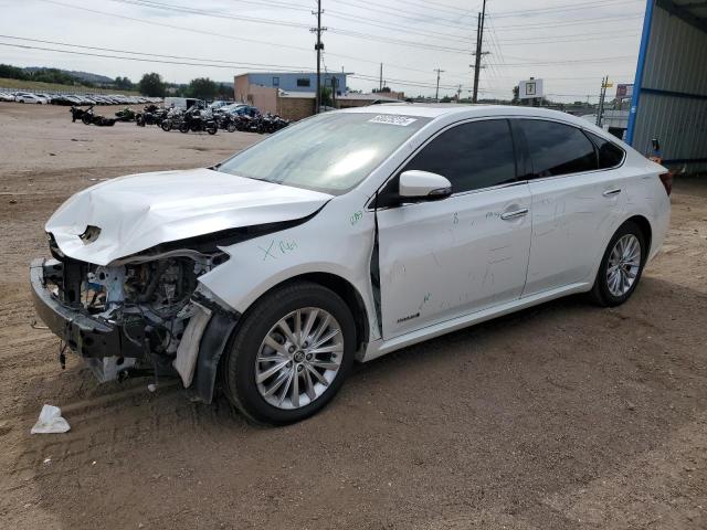 TOYOTA AVALON HYB 2018 with VIN 4T1BD1EB0JU063845 - Photo from auction