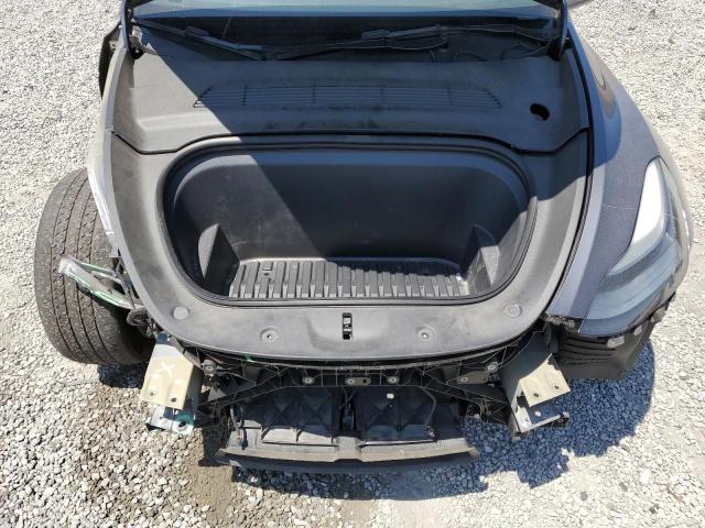 Photo 11 from auction – 2023 TESLA MODEL Y with VIN 7SAYGAEE7PF624322